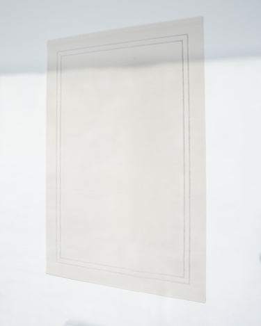 Sege Rug minimalist beige rug with soft tonal pattern