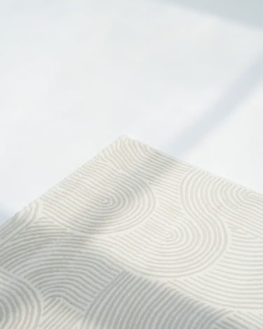 Suri Rug modern white rug with curved pattern design