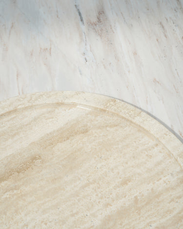 travertine marble serving platter on stone surface