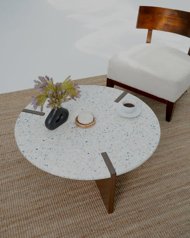Modern round coffee table with terrazzo top and wood base