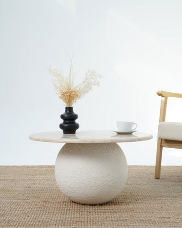 Aurela travertine coffee table with sculptural micro cement base