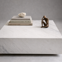 Large square marble coffee table with polished white stone finish