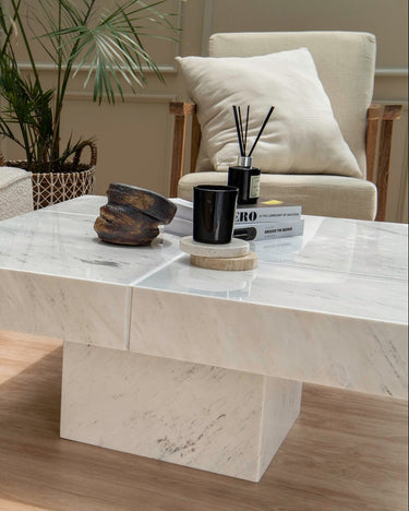 White marble square coffee table with pedestal base