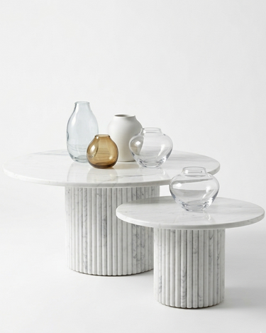 Margot nesting coffee table set in White Volakas marble, large and small round tables with fluted base, minimalist contemporary living room furniture