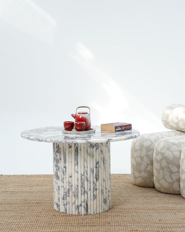 Noris marble coffee table with fluted marble base