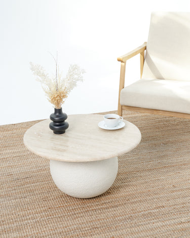 Round Aurela coffee table with beige travertine stone top