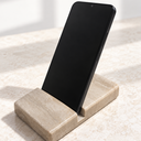 Serpeggiante Marble phone holder supporting a phone in portrait orientation