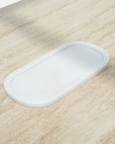 elongated white marble platter with smooth finish