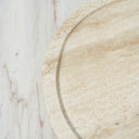 round stone platter with natural porous texture