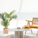 Round Lorin coffee table with sculptural marble base
