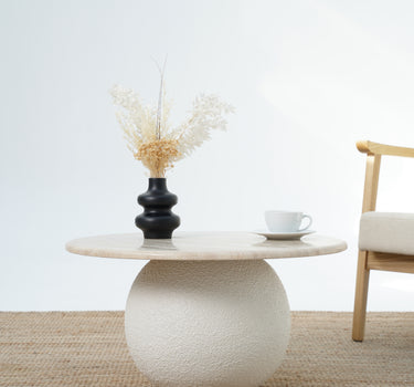 Aurela travertine coffee table with sculptural micro cement base