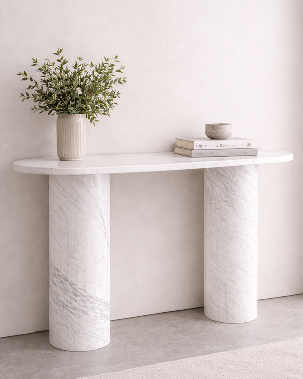 Evelyn console table in White Volakas marble, 120 cm modern minimalist console with oval top and cylindrical marble legs in neutral interior