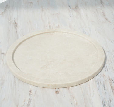 Juno round crema marble platter with recessed centre