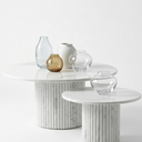 Margot nesting coffee table set in White Volakas marble, large and small round tables with fluted base, minimalist contemporary living room furniture