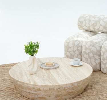 Teroco travertine coffee table with round sculptural design