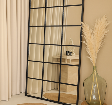 Vian black grid floor mirror with rectangular window pane design in modern interior