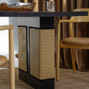Carin Black Oak Dining Table with Natural Rattan Legs