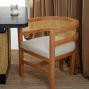 Carin Black Oak Dining Table with Natural Rattan Legs