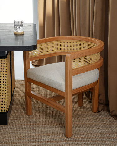 Carin Black Oak Dining Table with Natural Rattan Legs